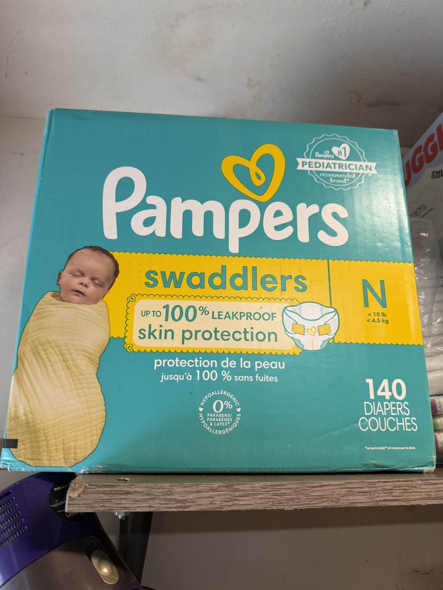 Unopened box: Pampers Swaddlers Diapers, Newborn - 140 Count