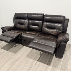 Comfy dark brown leather 3 seater recliner sofa. 