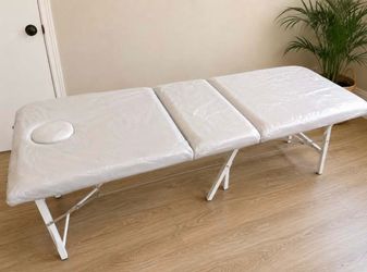 Massage table