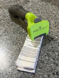 FURminator Small Dog Undercoat deShedding Tool for short hair.