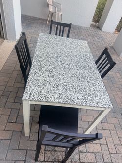 Dining Table with 4 Black Chairs
