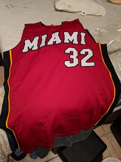 Authentic autographed Miami Heat Shaquille O'Neal jersey. WITH certificate of authenticity, kept in original plastic- never worn or displayed.