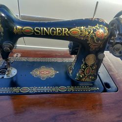 Singer Sewing Machine In Cabinet