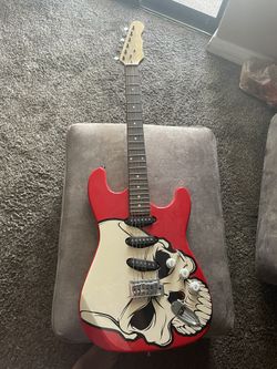 Unknown brand skull electric guitar