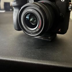 Panasonic LUMIX G7 Mirrorless Micro 4/3 Camera W/14-42 Lens, Battery, Charger, And 64gb SD Card