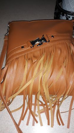 Crossbody purse with fringed hanging