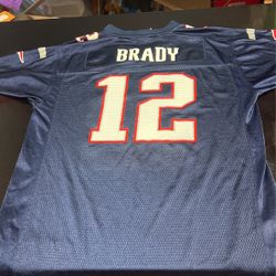 **Reduced**   Tom Brady New England Patriots  official nfl jersey.    boys xl