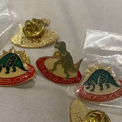 Rare collectible Vintage 1987 Dinosaucer Lapel Pin. Coca Cola Telecommunications 1987 Printed on the back. Brand new in original sealed bag. Multiples