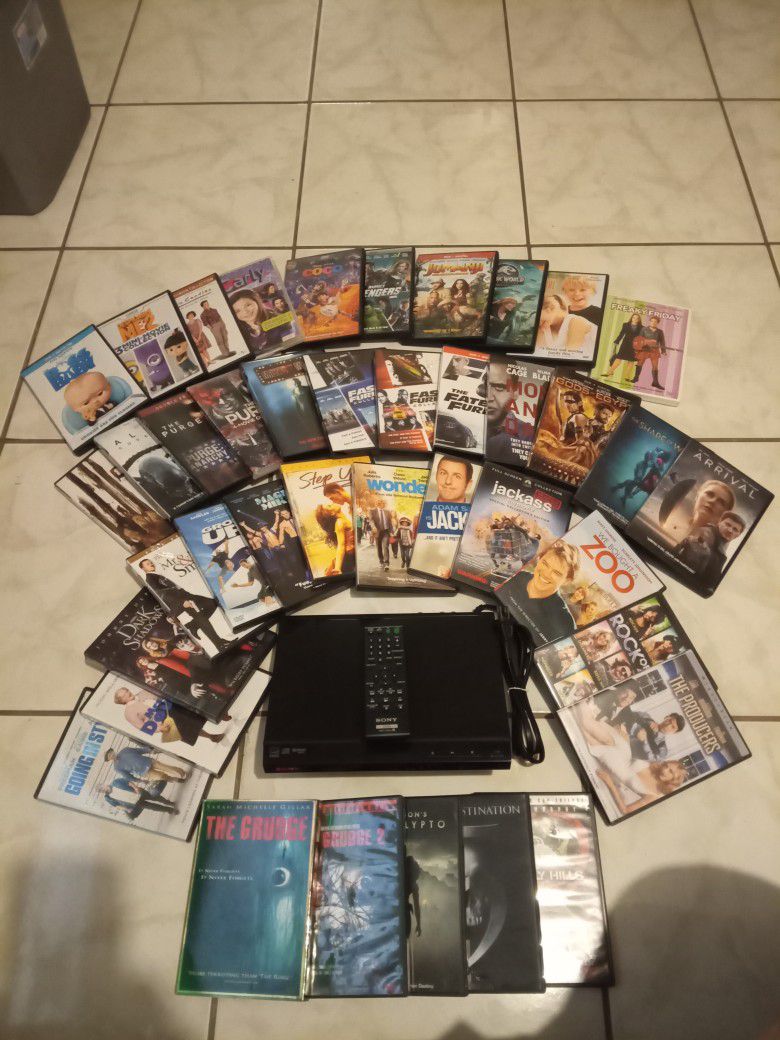 40 MOVIES : KIDS+FUNNY+HORROR+ACTION+ SONY DVD PLAYER FOR FREE EVERYTHING IN NEW 100% PERFECT WORKING CONDITION.
