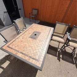 Free table plus 6 chairs.