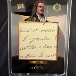 This is a trading card from the "Pieces of the Past" series that features an authentic relic, which is a piece of an original handwritten document, fr