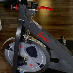 Like-New Sunny Health & Fitness Smart Pro Indoor Cycling Bike – Quiet Belt Drive + App Connected 