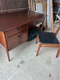 Mid century desk with matching chair in very good condition