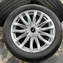 22” 2024 Cadillac Escalade wheels rims tires Bridgestone 275/50R22 100% Tread SENSORS