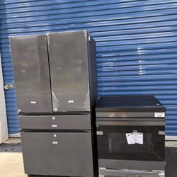 New Samsung Electric bespoke induction stove and new black stainless steel 4-door bespoke refrigerator
