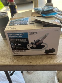 Non-submersible transfer pump