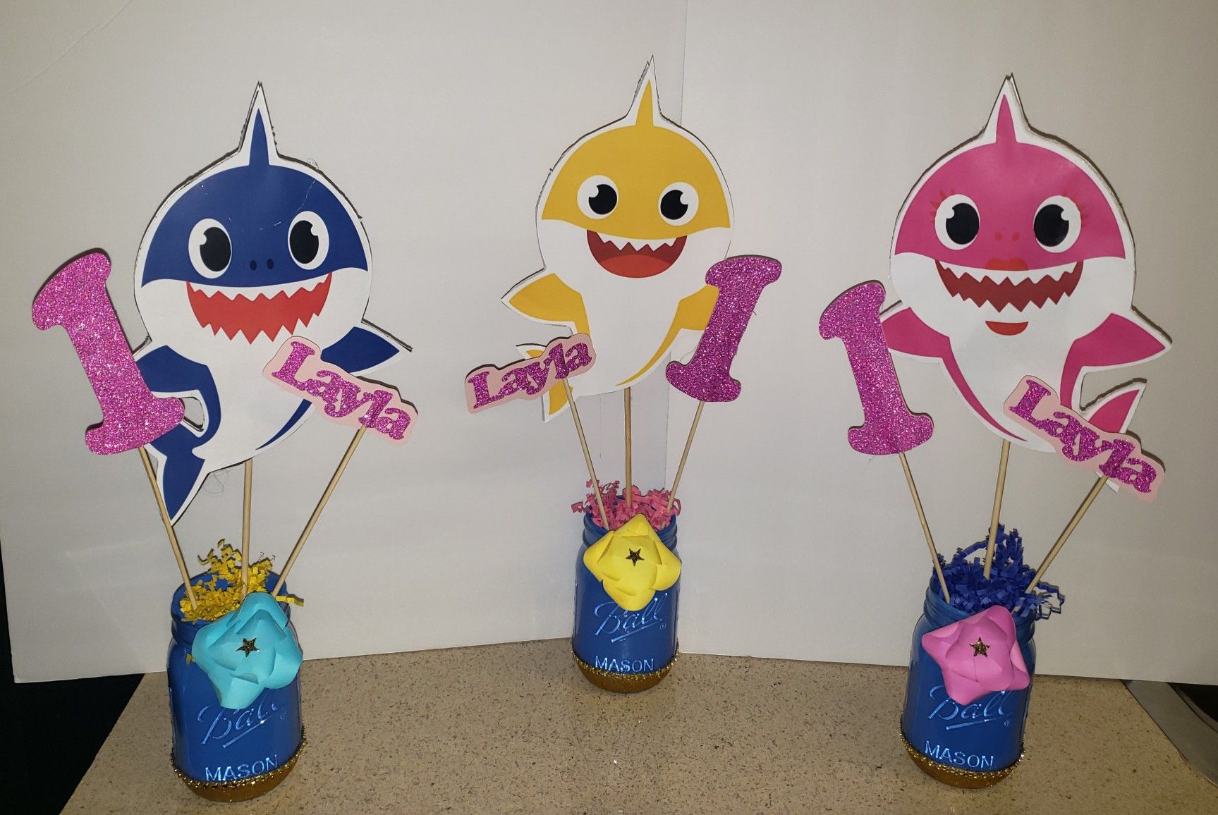 Baby Shark centerpieces and candy bags. Ask for prices.