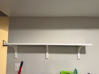 White Wall-Mounted Shelf with Brackets