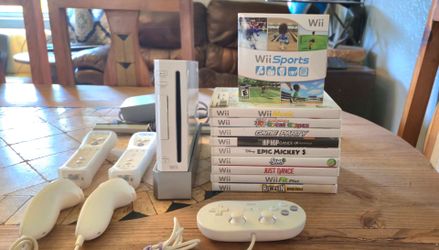 Nintendo Wii Sports Bundle with 10 Games and Controllers.