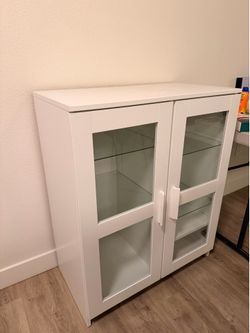 White glass door cabinet