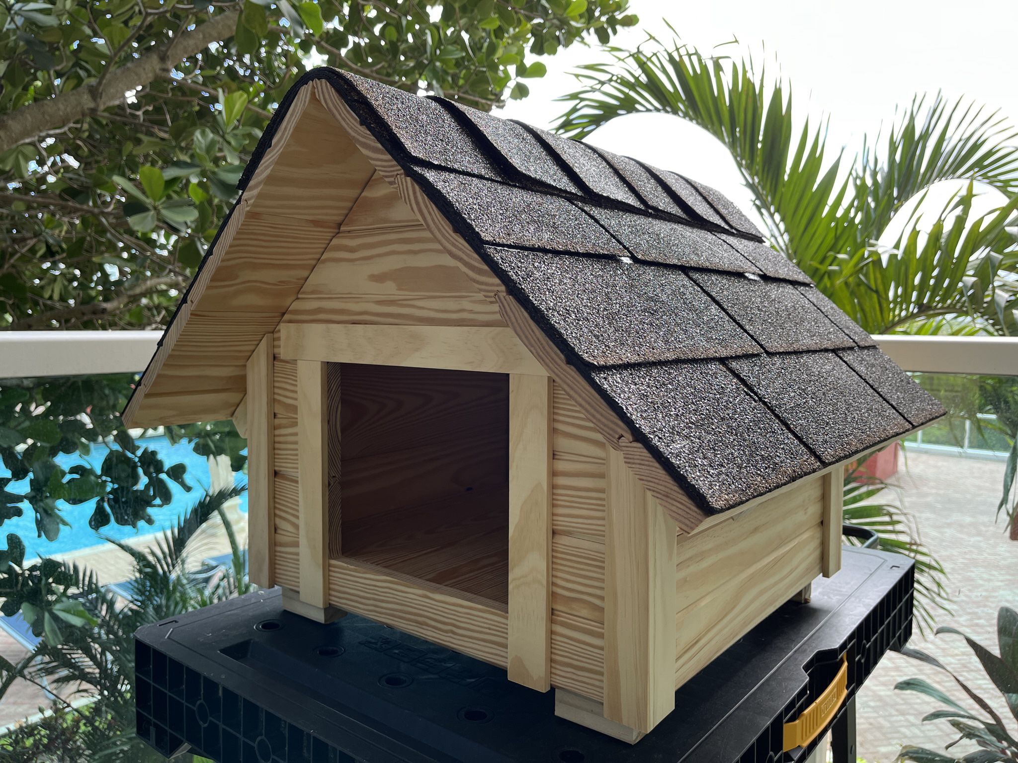 Dog House with Real Roof. Handmade in The USA   Sizes dog house : 20 1/4 * 19 3/4 * 21 inches   Roof: 27 3/4 * 27 1/2 inches   Door: 9 3/4 * 8 1/4 inc