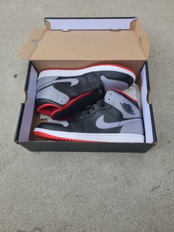 Air Jordan 1 Mid Black/Grey/Red. New in box. Never worn