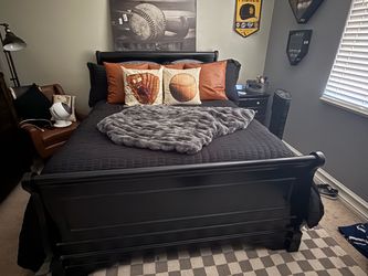 Black queen bed frame and nightstand
