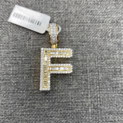 Charm 10k Yellow Gold With Round And Baguette diamond