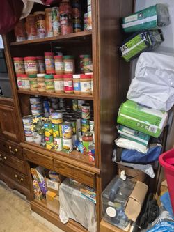 Clothes  ,cases of food , kid cloths. GAMES , Freezer. Hutch , night stand,  dresser , kid toys ,old dvds ,kid dvds glass dishes