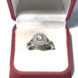 Brand new .925 silver wedding ring with cubic zirconia CZ diamonds. Size 8.