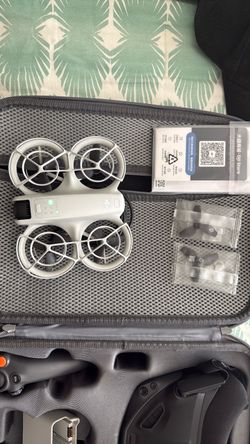 DJI Neo with Googles and 3 batteries .