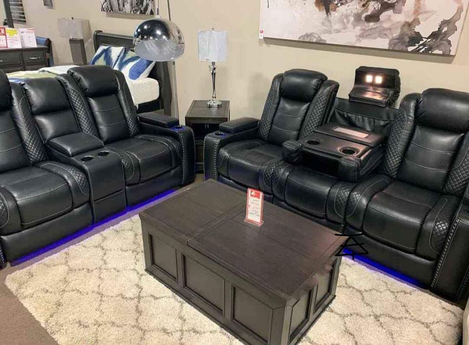 Party Time Midnight Reclining Sofa And Loveseat$10 Down Payment And Financing Available