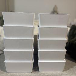 Small white storage boxes