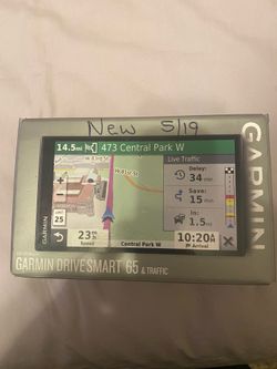 Garmin DriveSmart 65 GPS navigator featuring a 6.95-inch edge-to-edge touchscreen display.