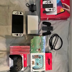 A Great Condition Switch Oled Console White 64 GB With Games + Pro Controller And More Bundle With It’s Include All The Accessories 