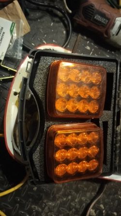 These are orange lights and there's some reflectors when you turn them on they flash they got a magnet on the back of them and they rechargeable I don