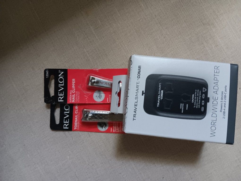 Worldwide Adapter For Travelers And Nails And Toes Clippers