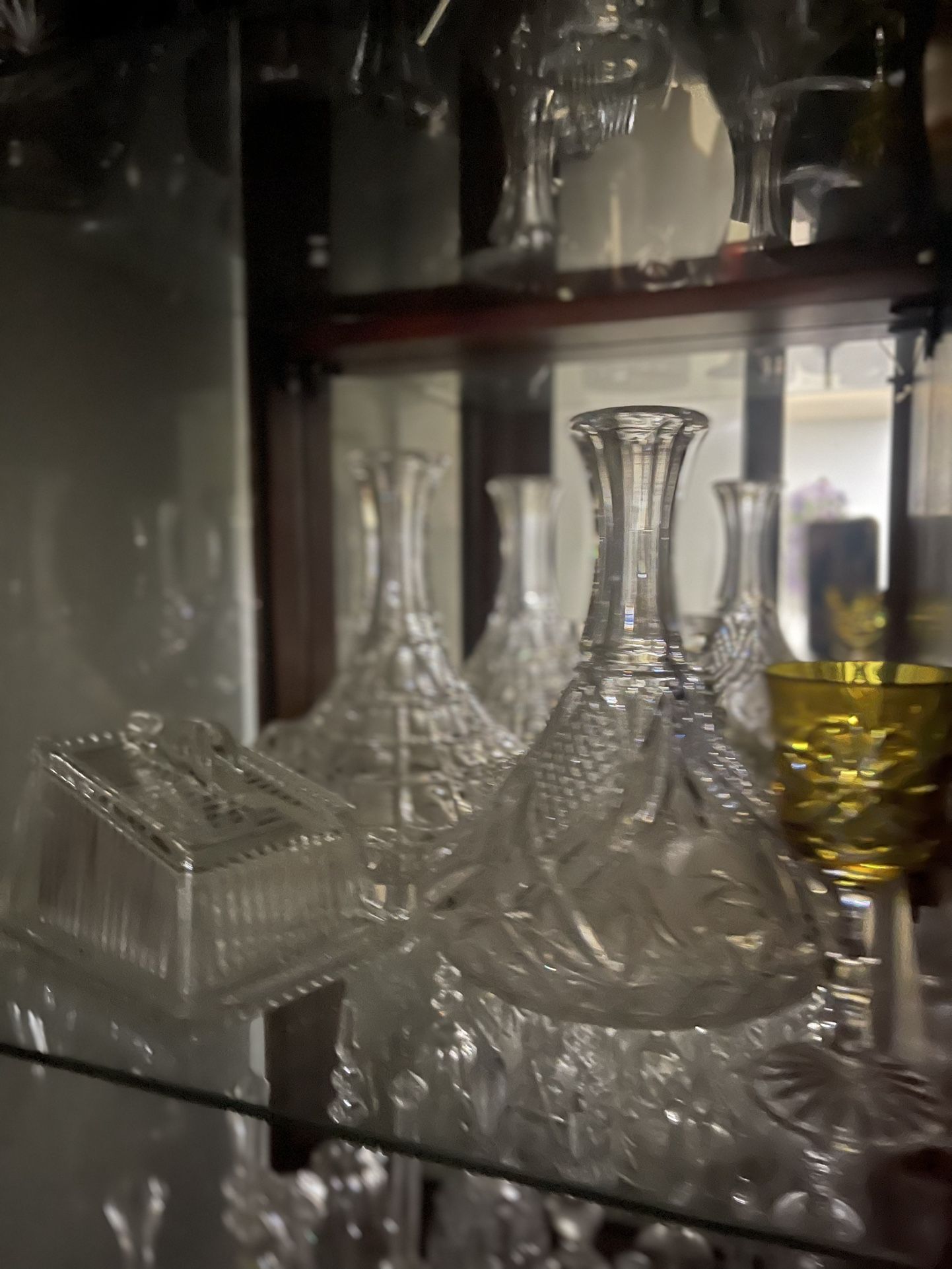 Collection of Vintage Crystal Bells, Decanters, and Glassware