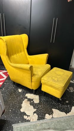 Old love seat with foot stool