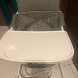 Hi Chair By Mica , Easy Fold For Travel Price.20$. Pick Up.  E. Side.  Tacoma