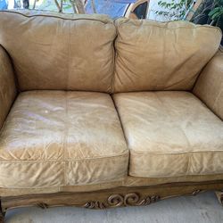 Ashleys Brown Leather Couches