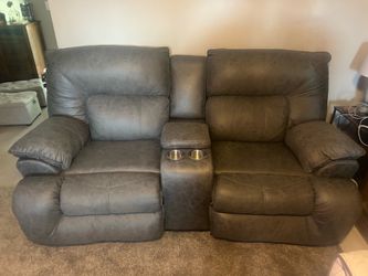 Brand new 2 seat with recliner on each end bough new from overstock wont fit right