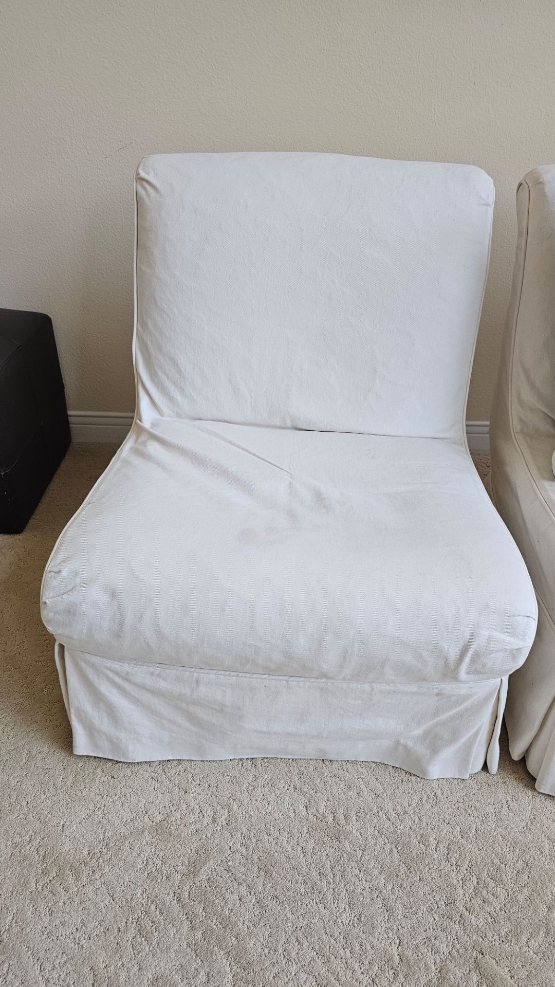 Chair with linen cover.
