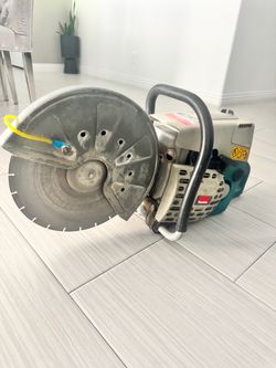 Makita DPC7301 is a 14-inch gasoline-powered concrete and metal saw