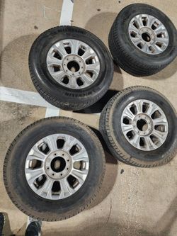 Ford f250/f350 factory aluminum wheels with tires