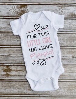For this baby we have prayed onesies