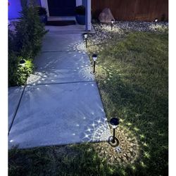  10 Pack Ultra Bright Solar Outdoor  Decorative Pathway Lights.  Cold White.  Light Patterns 