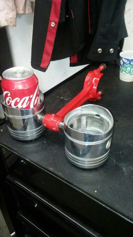 Custom piston cup holder