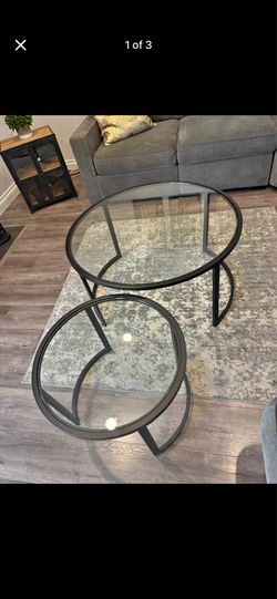 Two glass coffee tables
