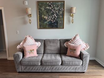Grey couch used for decor for a few months like new condition no flaws stains or snags asking 500$ OBO willing to accept reasonable offers